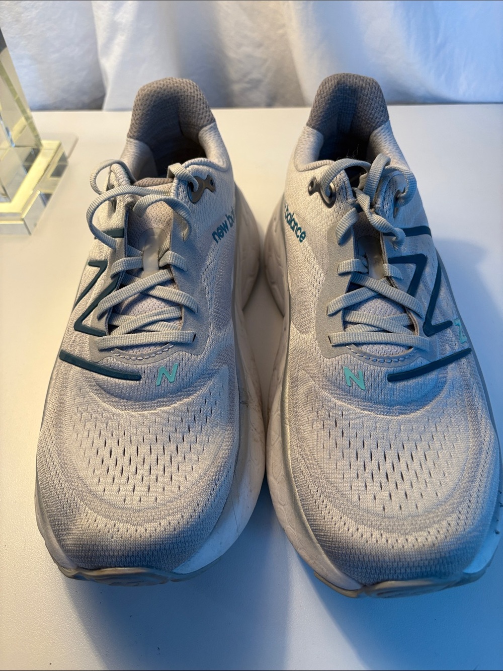 Men’s New Balance Light Gray Sneakers with Teal Accents